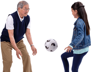 Two people playing soccer